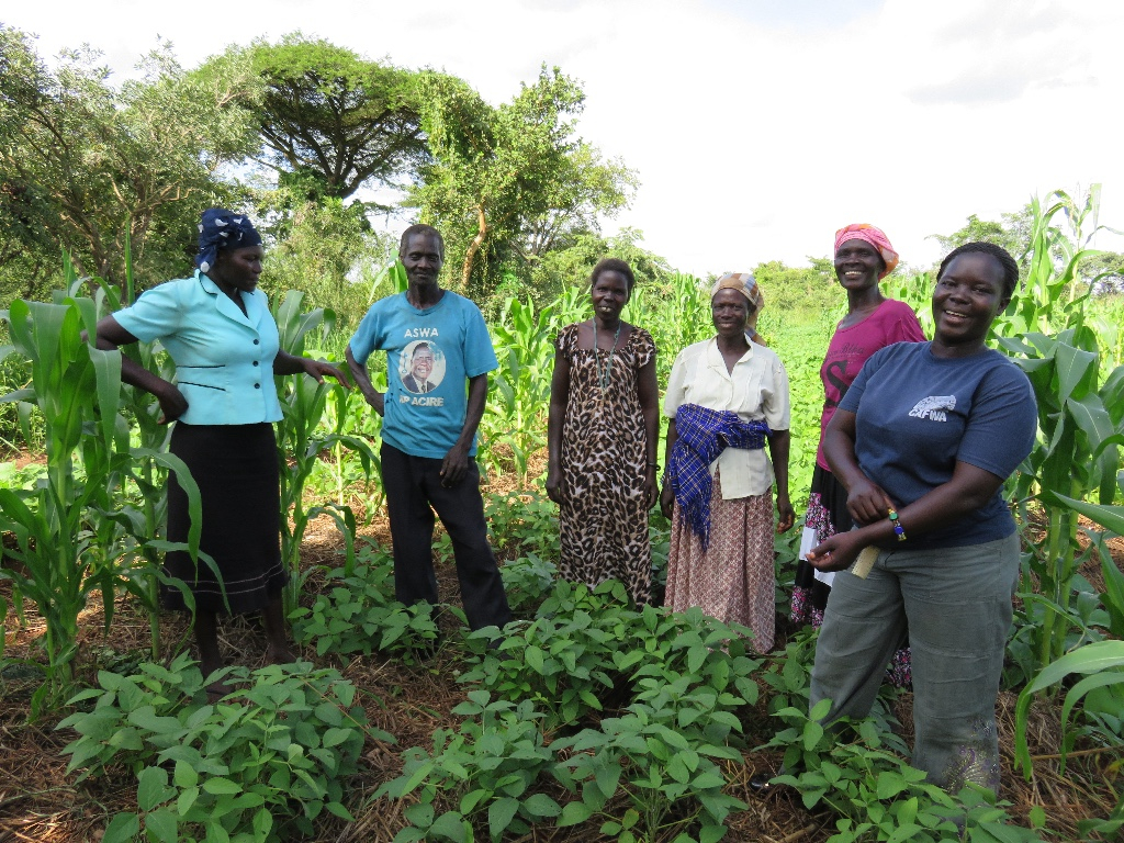 Our Program Officer, Pamela, with members of the group in the demonstration garden. We love having women in charge of our programs! Members get individual support from Pamela and her team twice a month.
